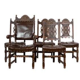 An oak extending dining table with eight dining chairs in the Louis XI style, early 20th century,