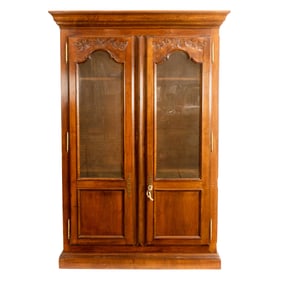 An Italian made French Provincial style armoire by Breuners
