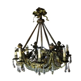 A Belle Epoque gilt bronze and cut glass eight light chandelier