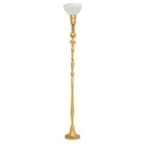 A gilt bronze floor Pomme de Pin floor lamp after a model by Alberto Giacometti