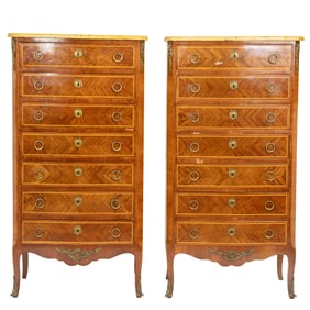 A pair of Louis XVI style marble top semaniers