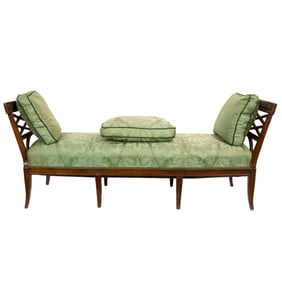 A French Directoire style carved walnut day bed, 19th century