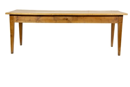 A French pine work table, 19th century, with one drawer, raised on tapering legs, 28