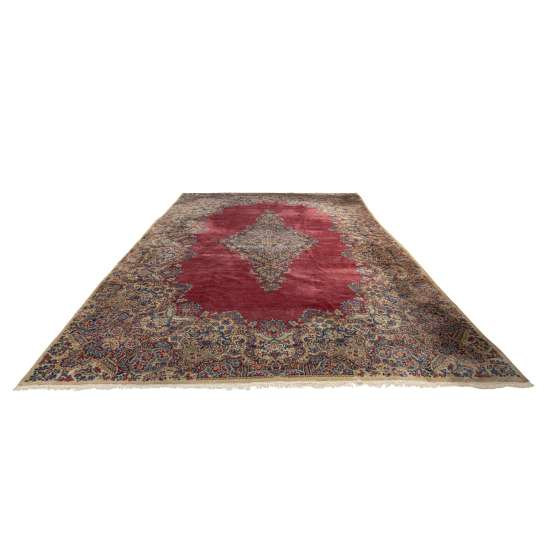 A Persian Kerman carpet: A Persian Kerman carpet, 10'9" x 18'9"