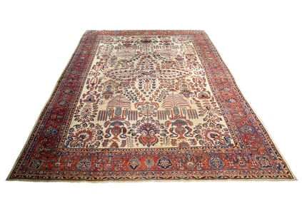 An antique Persian Mohajeran Sarouk carpet