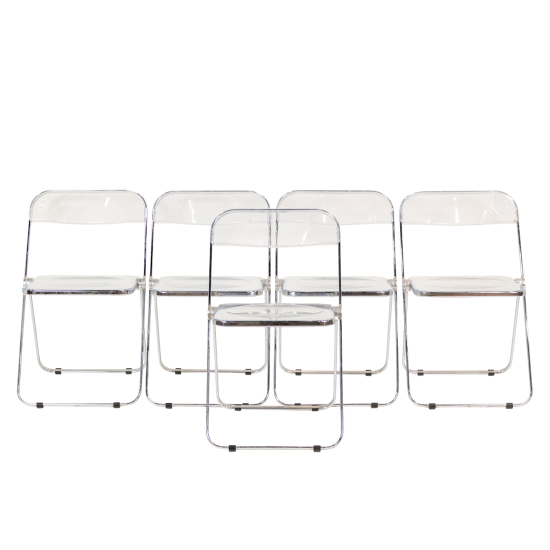 A set of five 'Plia' clear molded plastic and chrome plated steel folding chairs by Giancarlo (1 of 5)