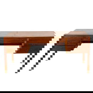 An Ole Wanscher for A.J. Iverson rosewood desk: An Ole Wanscher for A.J. Iverson rosewood desk, fitted with one long drawer flanked by three short drawers, 29"h x 67"w x 33.5"d