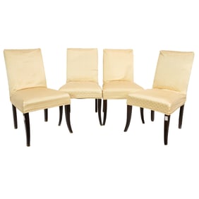 A suite of eight Crate & Barrel dining chairs, in ivory upholstery,with eight slip covers