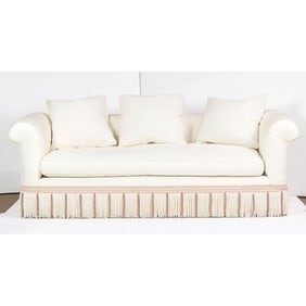 A sofa upholstered in ivory faille, Senator Feinstein Estate