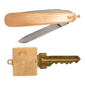 Two 14k gold and metal accessories