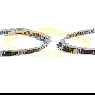 A sapphire, diamond, and 14k gold bracelet: A sapphire, diamond, and 14k gold braceletFeaturing 60 baguette-cut sapphires, weighing in total approximately 3.00 carats, interspersed by 24 single-cut diamonds; 14.75 grams; length: 6 3/4 in