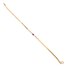 A ruby, diamond, and 14k gold bracelet
