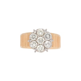 A diamond and 14k gold ring