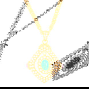 An emerald, ruby, sapphire, diamond and 18k gold pendant necklace: An emerald, ruby, sapphire, diamond and 18k gold pendant necklacecentering an oval emerald cabochon weighing approximately 1.20 carats, framed by round brilliant-cut diamonds weighing approximately 0.
