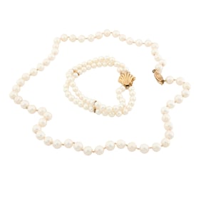 A cultured pearl and 14k gold necklace and bracelet