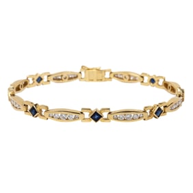 A diamond, sapphire, and 14k gold bracelet