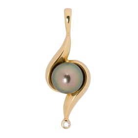 A black cultured pearl, diamond and 14k gold pendant