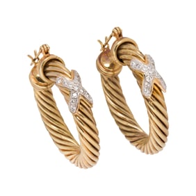 A pair of diamond and 14k gold cufflinks