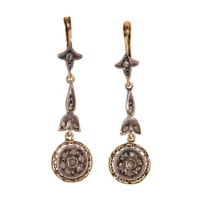 A pair of diamond and silver-topped 14k gold earrings