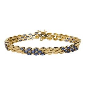 A sapphire and 14k gold bracelet