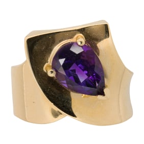 An amethyst and 14k gold ring