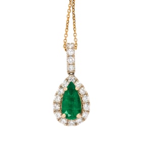 An emerald, diamond, and 14k bi-color gold necklace