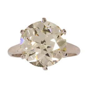 A diamond and platinum solitaire ring