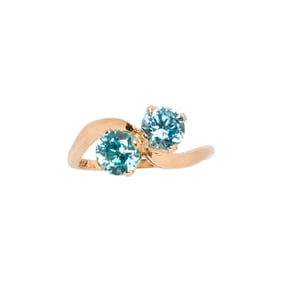 A blue zircon and 14k gold ring