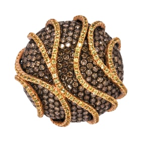 A colored diamond, yellow sapphire, and 18k gold ring