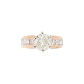 A diamond and 18k gold ring