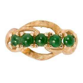 A jade and 14k gold ring