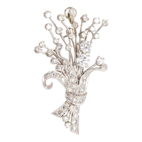 A diamond and platinum brooch
