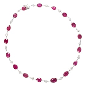 A ruby, diamond, and 14k white gold necklace