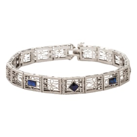 A synthetic sapphire and platinum-topped 14k white gold bracelet