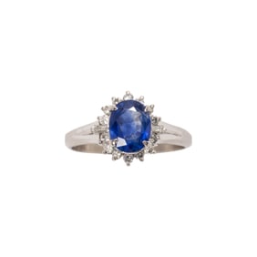 A sapphire, diamond and platinum ring