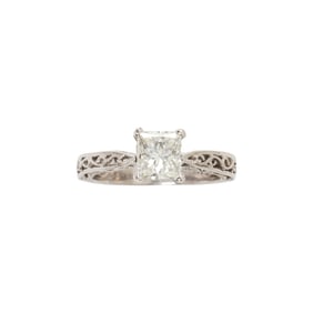 A diamond and 14k white gold ring