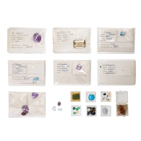 A group of loose gemstones