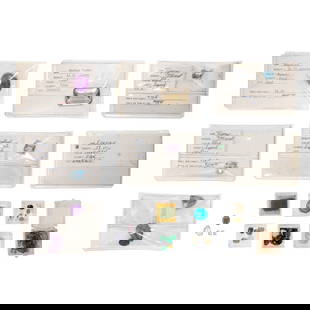 A group of loose gemstones: A group of loose gemstonesComprising 17 containers of gemstones of varying cuts and sizes
