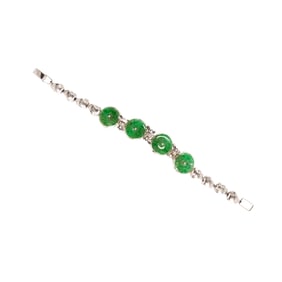 A jade and 18k white gold bracelet