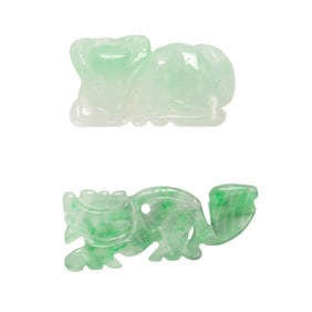Two carved jade pendants