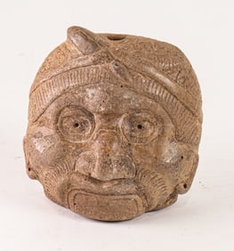 A Mayan head effigy bottle