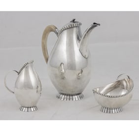A German Jugendstil Wilhelm Binder sterling three-piece coffee service