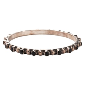 A Navajo onyx and silver bracelet