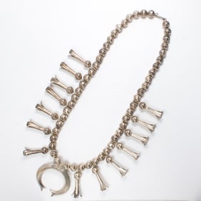 A Native American silver necklace and earrings