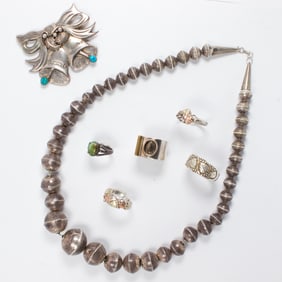 A group of silver jewelry