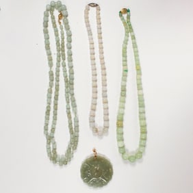 A group of jade jewelry