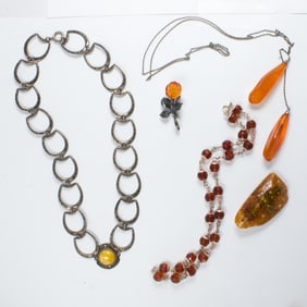A group of amber and silver objects