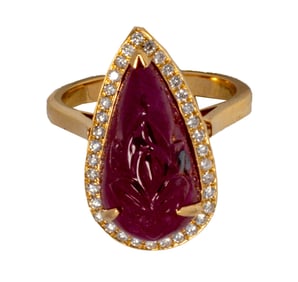 A ruby, diamond, and 18k gold ring