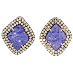 A pair of tanzanite, diamond, silver, and 14k gold earrings