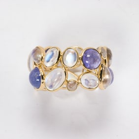 A tanzanite, moonstone, and diamond ring